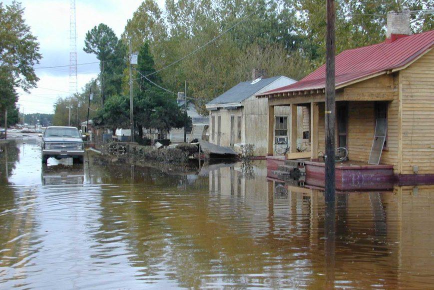 The muddy deserted streets of flood ravaged Princeville, North Carolina stand in silent testimony to the destruction wrought by the Tar River. Princeville, NC 9/28/99. Photo By Dave Saville/FEMA News Photo.