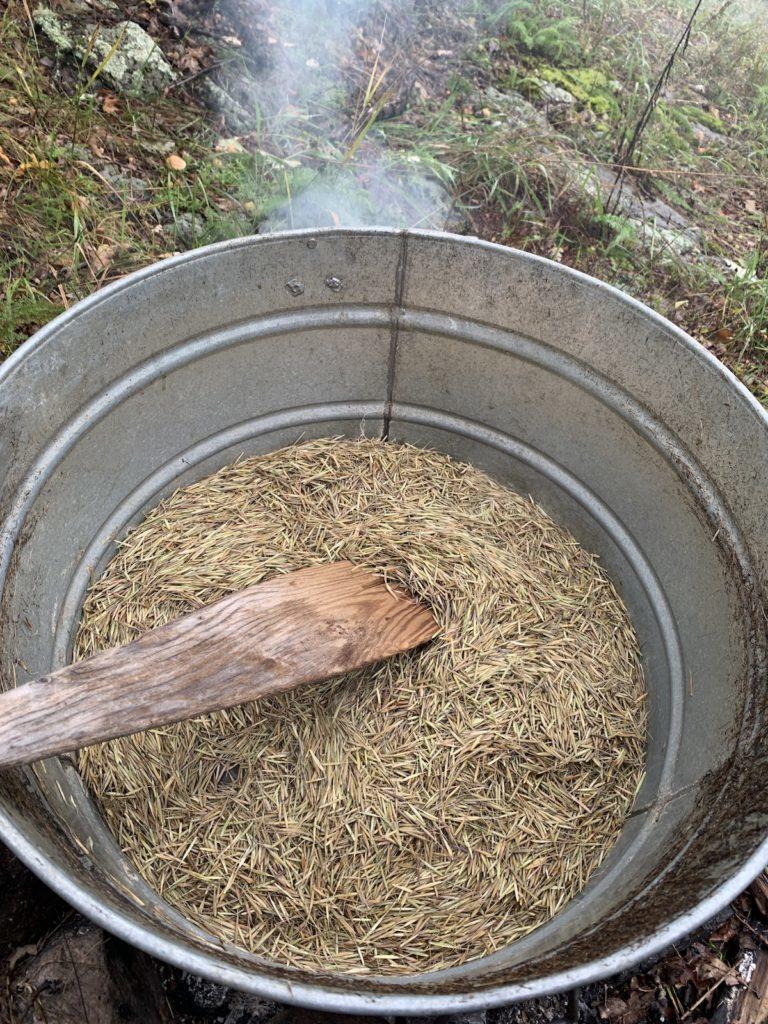From "What Listening Means in a Time of Climate Crisis." Photo of roasting wild rice by Tara Houska.